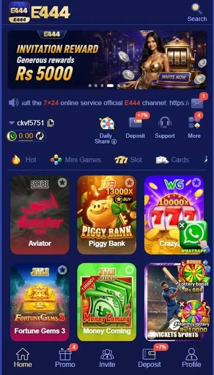 E444 Game slot game interface with spin button and winning screen.